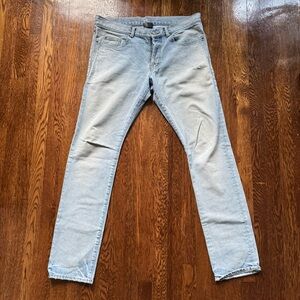 Saint Laurent Blue Skinny Jeans with Distressed Details